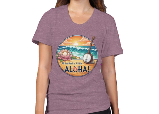Woman wearing a mauve t-shirt with an ALOHA graphic design .