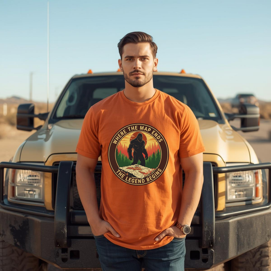Man wearing a bigfoot t-shirt in front of his big truck